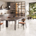 Onyx Ivory in Polished and Matt Tiles white marble-effect tiles with an oval dining table