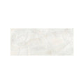 A rectangular onyx ivory matt marble effect tile 60 x 120 with subtle natural white marble veining pattern