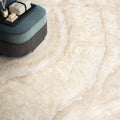 Onyx ivory polished cream-colored marble-effect floor tiles with subtle veining and a glossy finish