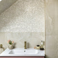 Onyx Ivory Polished Marble Effect Tile 60 x 120 white marble-effect tiles with a sink and brass tap