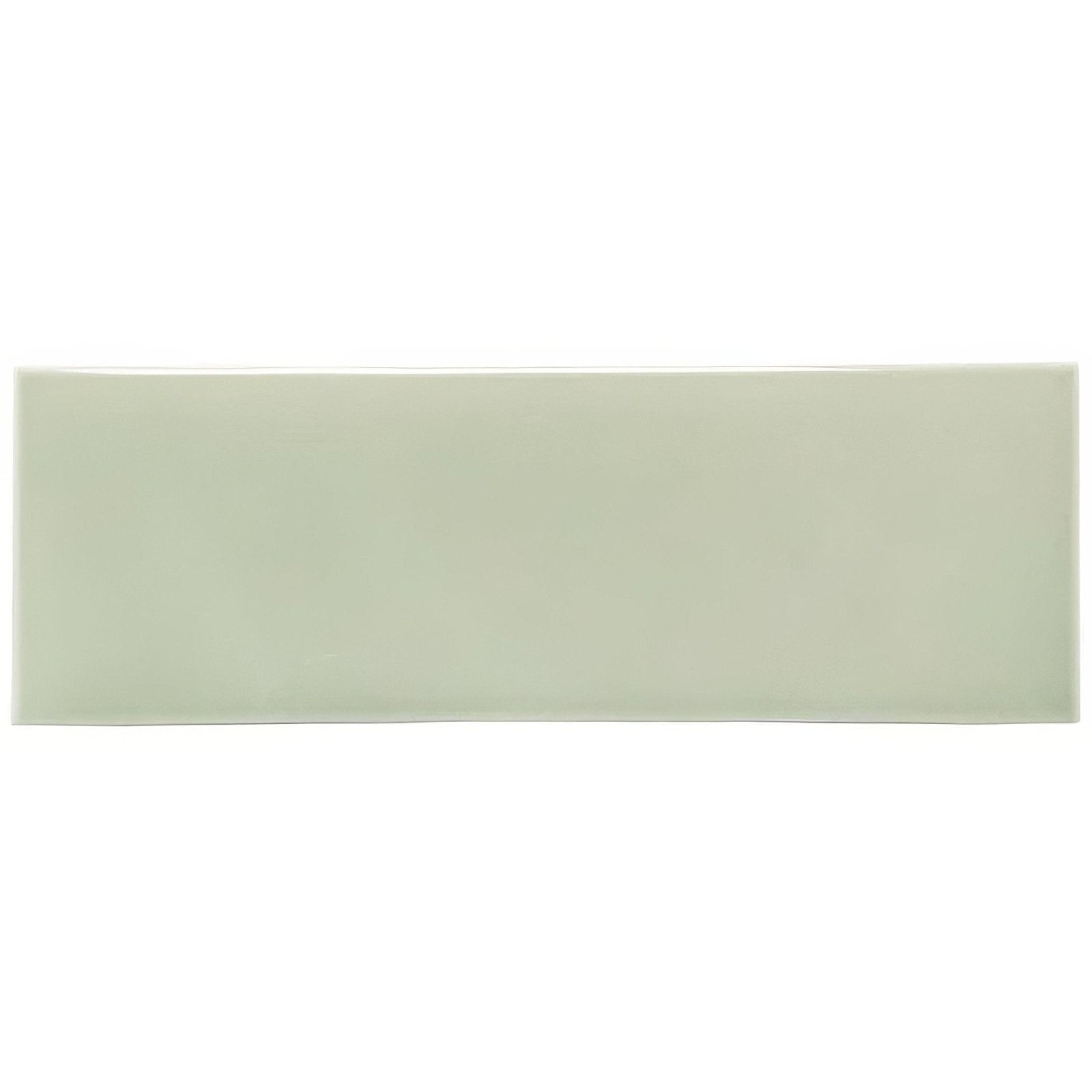 A sleek rectangular ceramic brick tile orford with a smooth matte sage green finish for wall and floor use