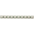 A row of ten glossy white spherical beads made of smooth material in a linear arrangement from orford empire