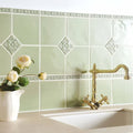 Orford Hampstead light green ceramic tiles with raised diamond floral patterns and decorative borders for kitchen backsplash