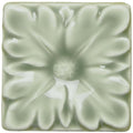 Orford Knightsbridge square ceramic tile with matte finish and raised floral design in soft sage green