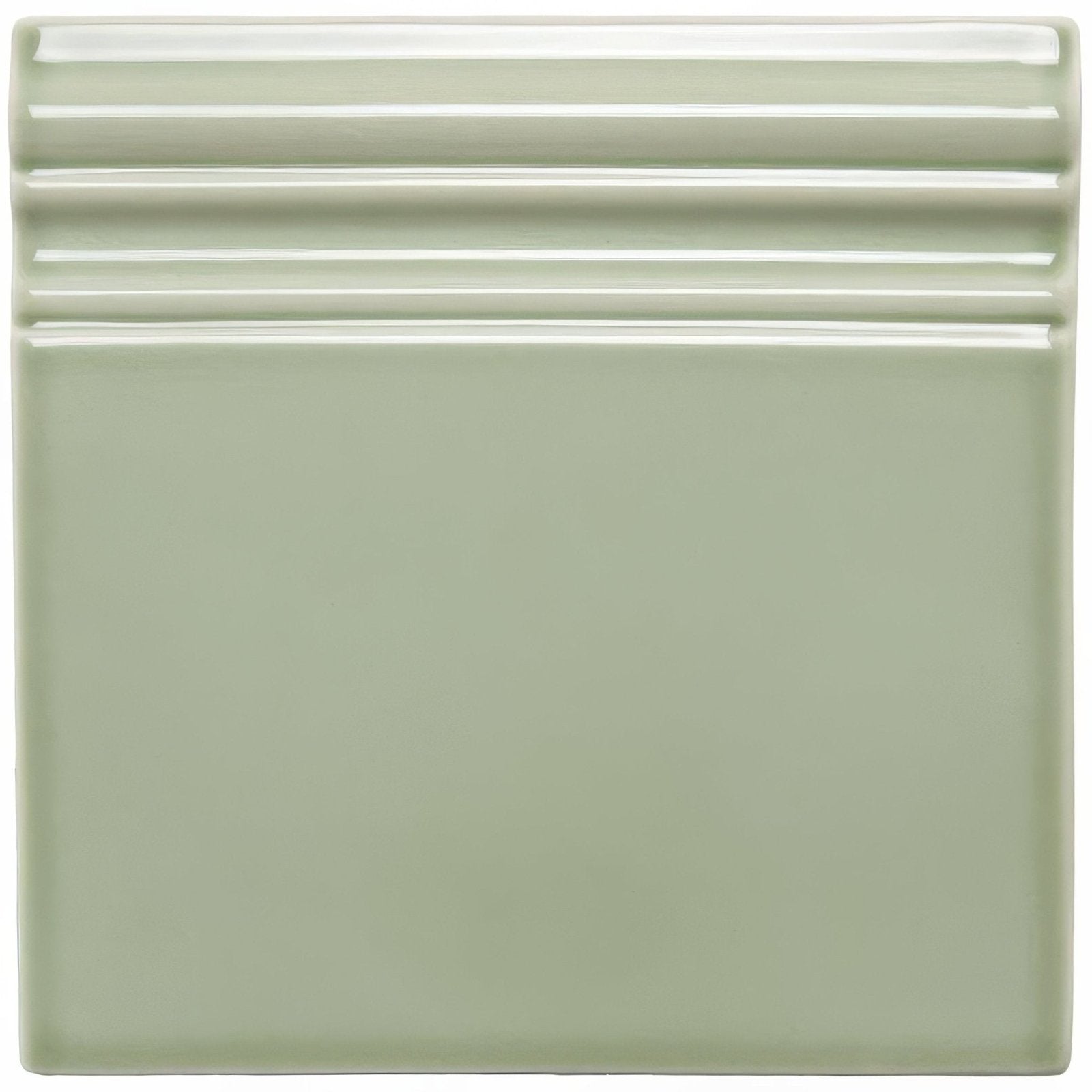 Orford skirting matte sage green ceramic tile with three horizontal ridges on top edge for decorative trim