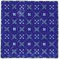 Deep blue ceramic tile ormeaux on amun with a repeating geometric pattern of lighter blue x-shapes and diamond accents