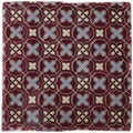 Ormeaux on Blackberry maroon ceramic tile with repeating geometric pattern of light blue and cream interlocking x shapes
