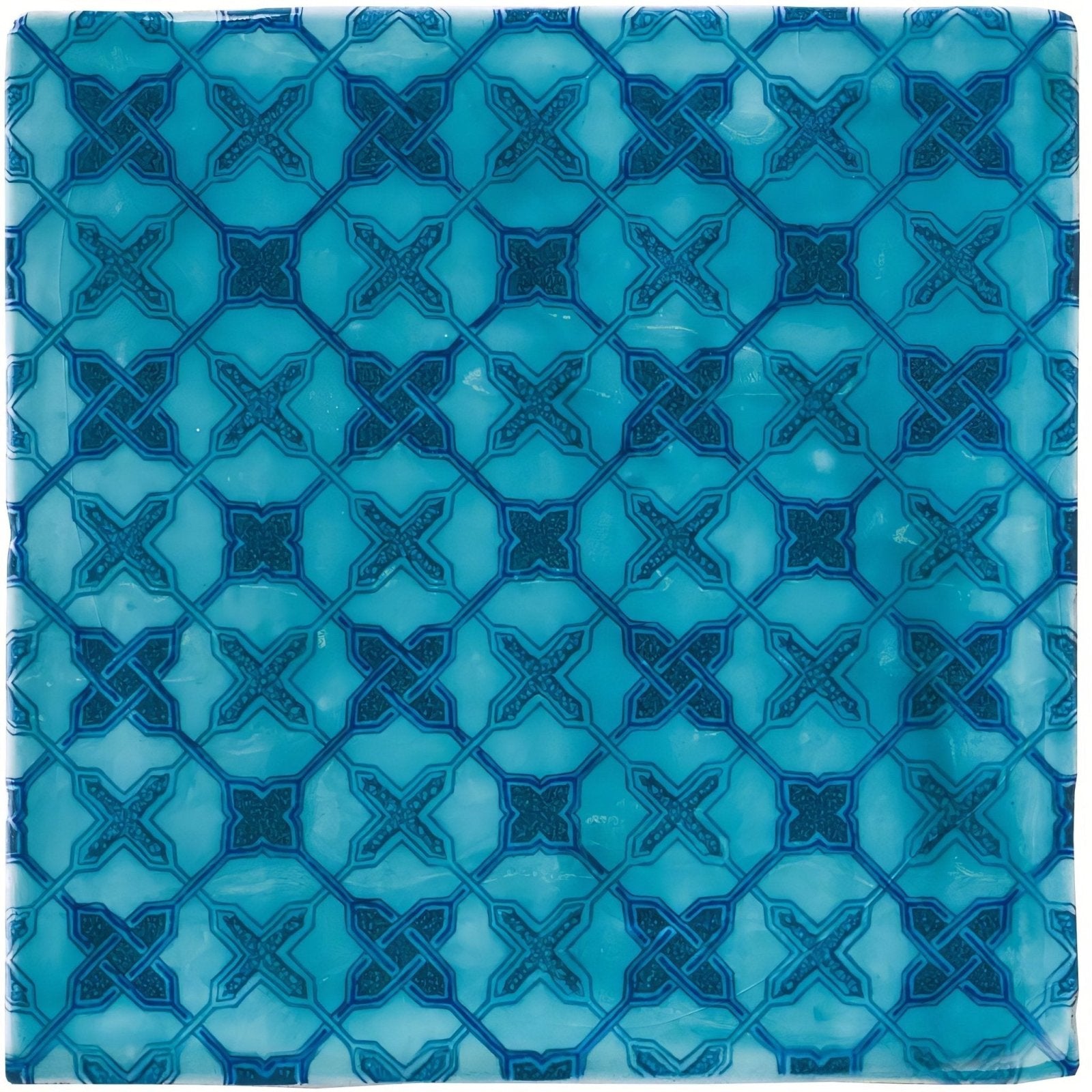 Ormeaux on Lagoon turquoise blue mosaic tile with repeating geometric pattern of interlocking x-shapes and diamond outlines