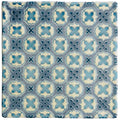 Square ceramic tile ormaux on palomino with a repeating geometric pattern in shades of blue and cream