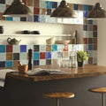 Ormeaux on Palomino multicolored mosaic tile backsplash with intricate blue red brown and beige geometric patterns