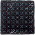 Dark blue ceramic tile ormeaux on sloe with glossy finish and intricate teal geometric x-shape pattern
