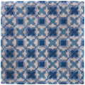 Blue and white patterned ceramic tile with repeating quatrefoil design from ormeaux on truffle collection