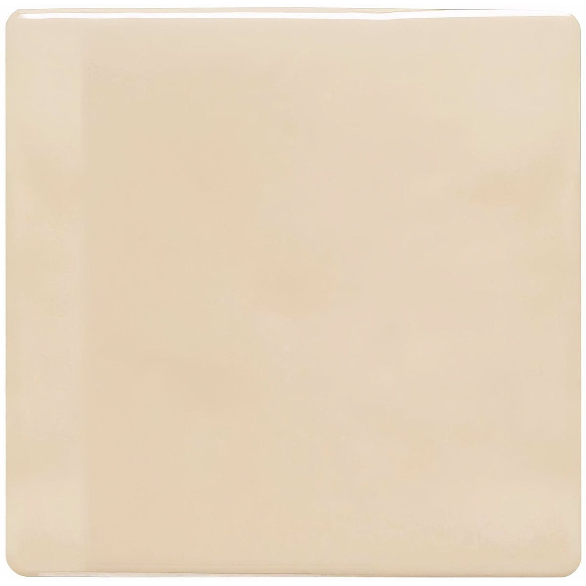 Cream-colored glossy ceramic oyster field tile with rounded corners suitable for flooring and walls