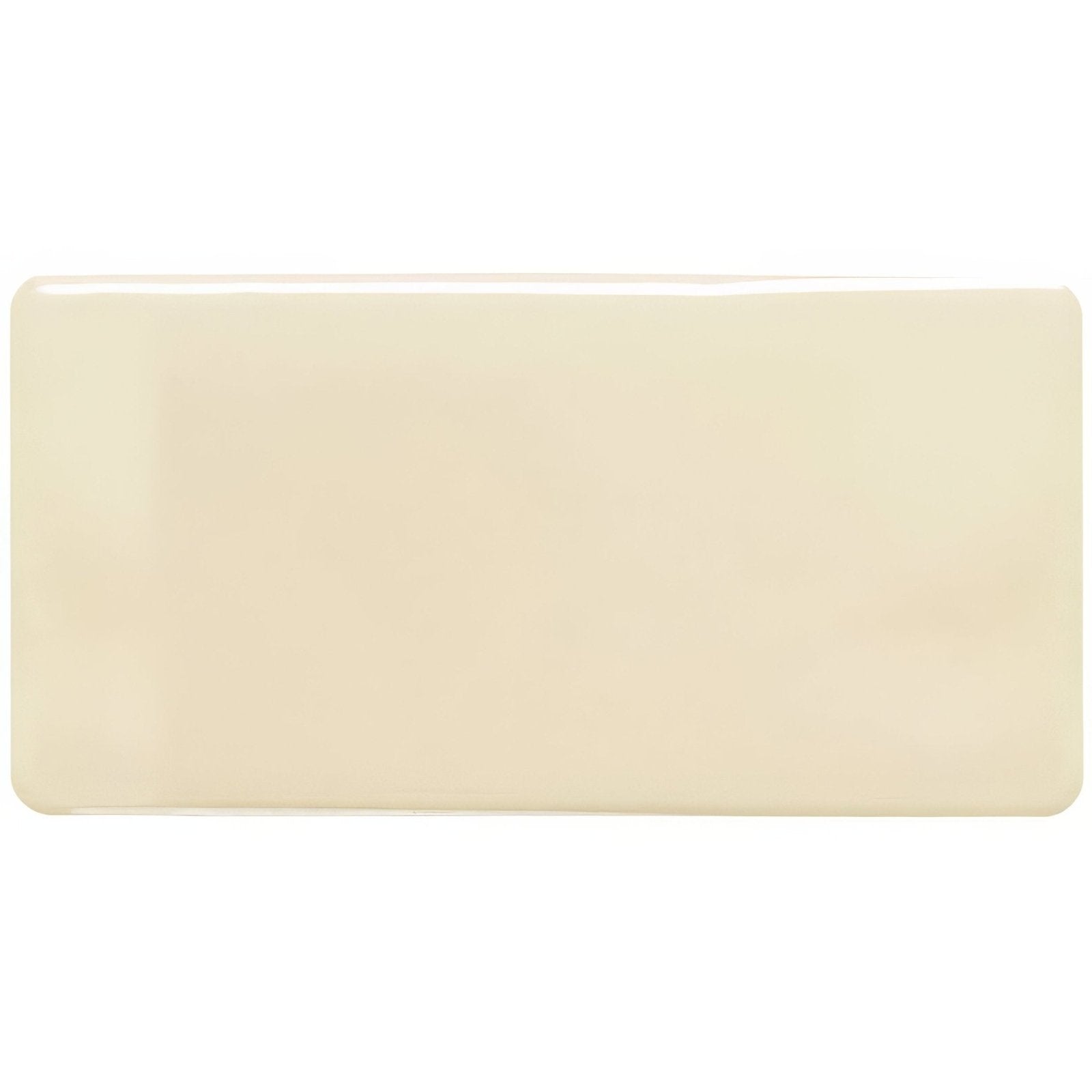 Cream-colored oyster half tile made of rectangular ceramic with a smooth glossy finish for wall or backsplash use
