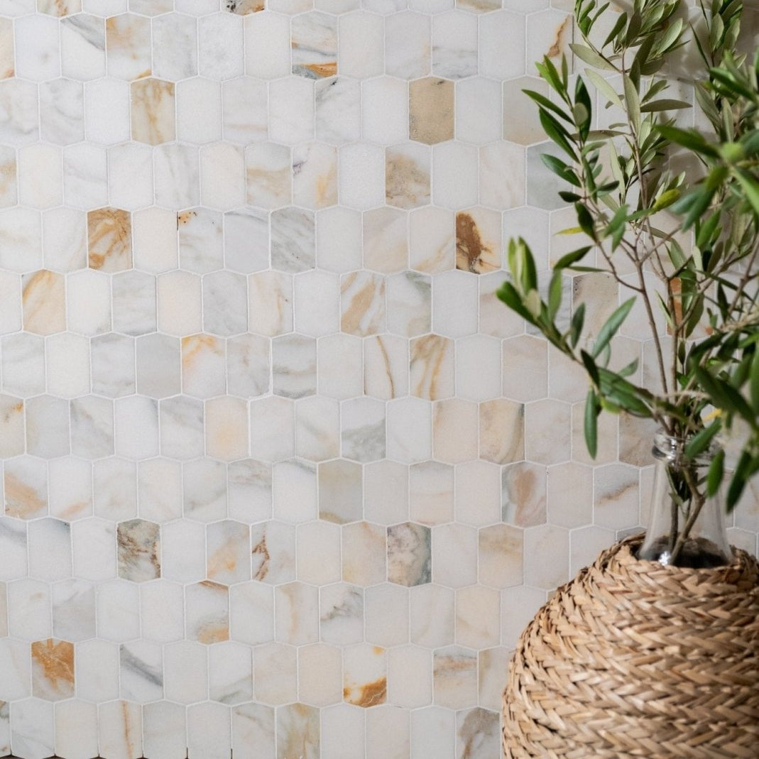 Hexagonal palazzo oro marble picket mosaic tile wall with white beige and gray veining for elegant interiors