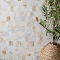 Hexagonal palazzo oro marble picket mosaic tile wall with white beige and gray veining for elegant interiors