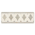 A rectangular Palazzo Valentini Border mosaic tile with gray and white fleur-de-lis pattern and thin borders