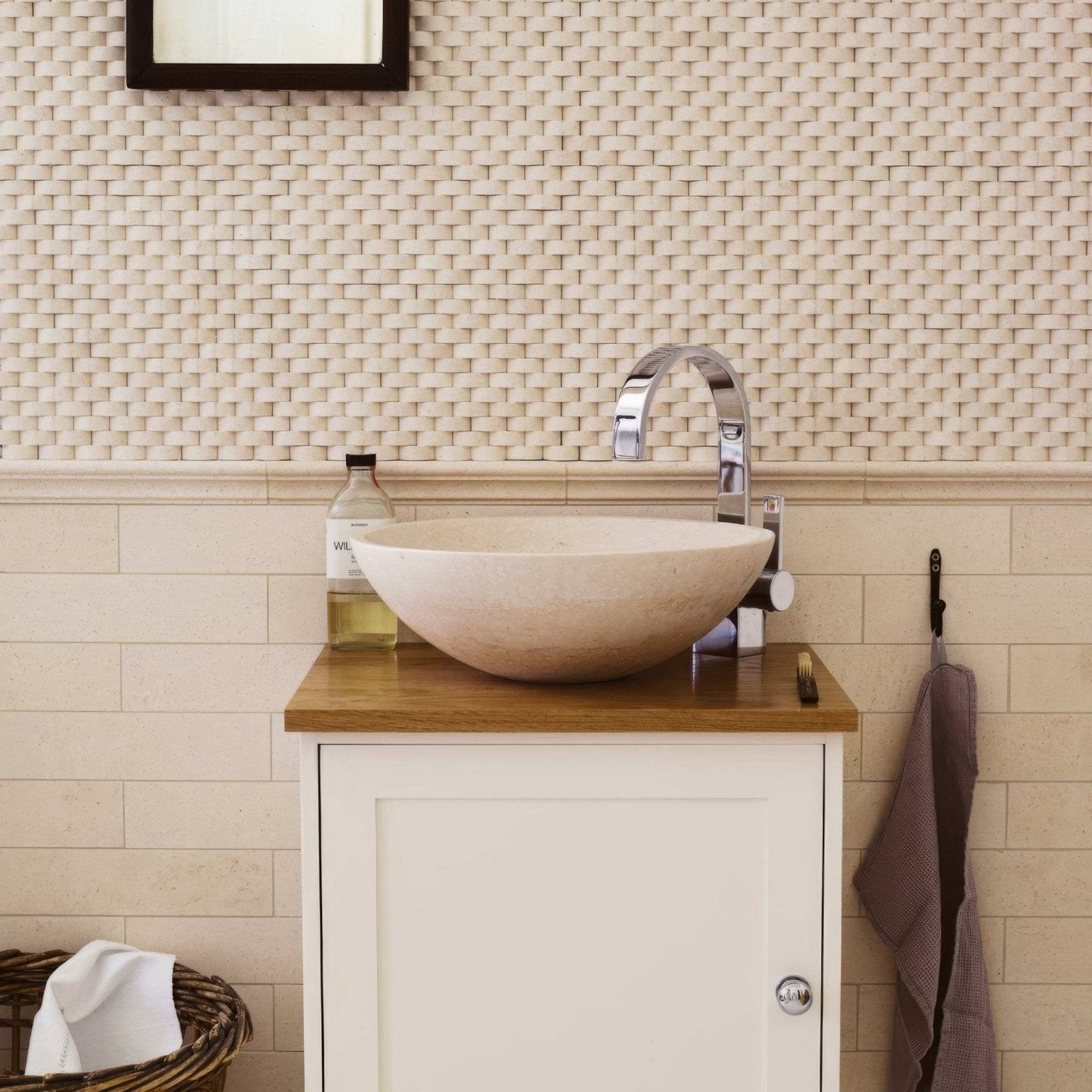 Beige stone vessel sink palio 60x30 diamond sawn edge honed with sleek chrome faucet on wooden countertop