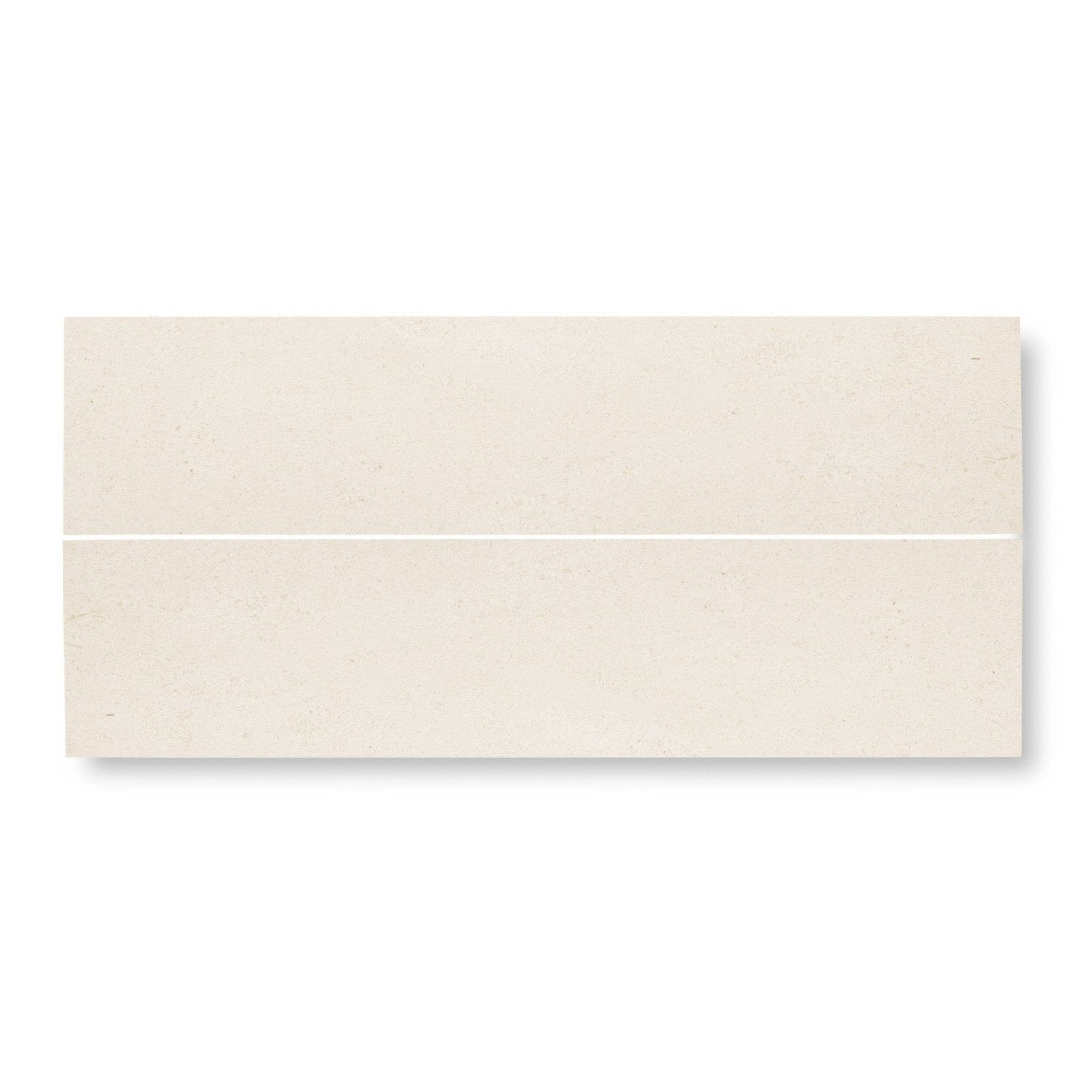 Cream-colored rectangular ceramic tile palio 7 x 30.5 with diamond sawn edge honed subtle matte finish and faint veining