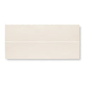 Cream-colored rectangular ceramic tile palio 7 x 30.5 with diamond sawn edge honed subtle matte finish and faint veining