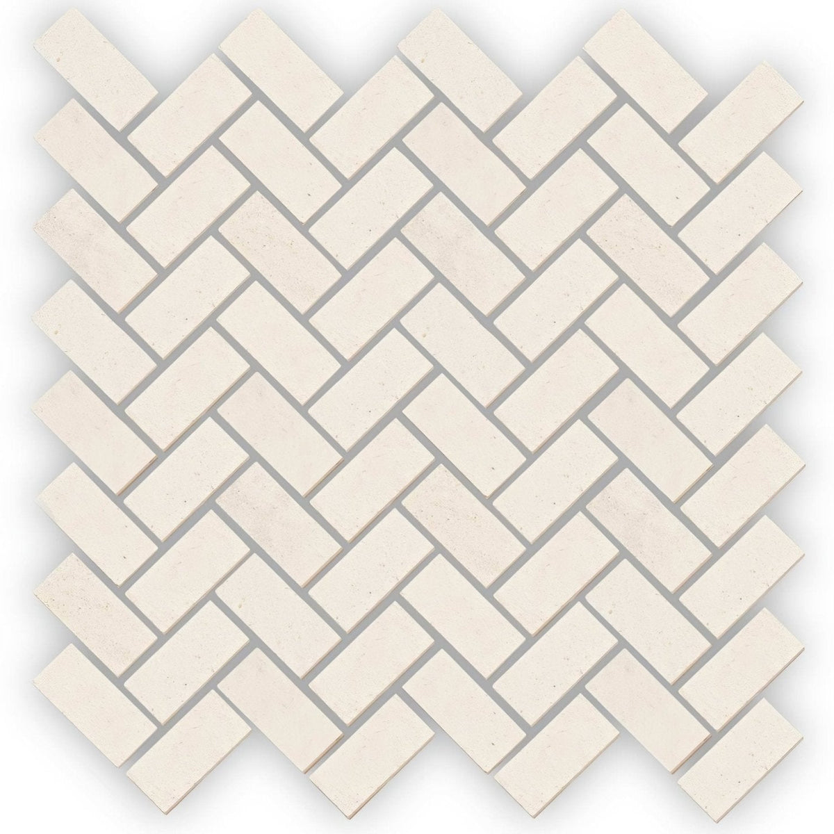 Palio limestone cream-colored rectangular mosaic tile arranged in a herringbone pattern for wall or floor use