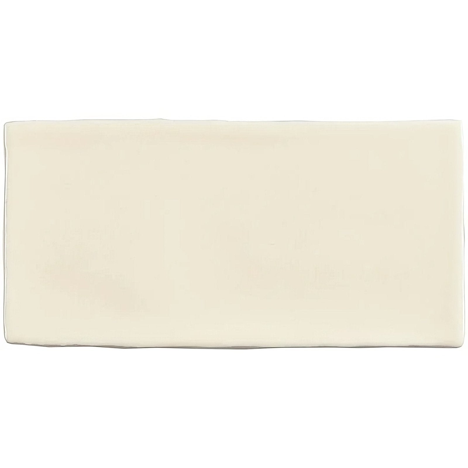 Cream-colored rectangular ceramic palomino brick tile with smooth slightly glossy surface for wall and floor use