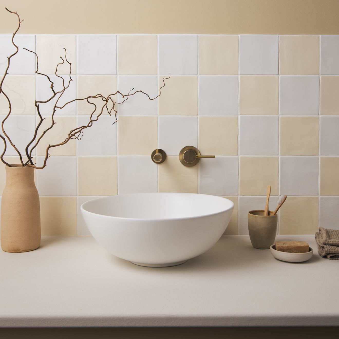 White ceramic bowl sink with smooth rounded design featured in palomino field tile product image