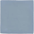 Pansy field tile is a square matte ceramic tile in a soft muted blue hue ideal for wall and floor use