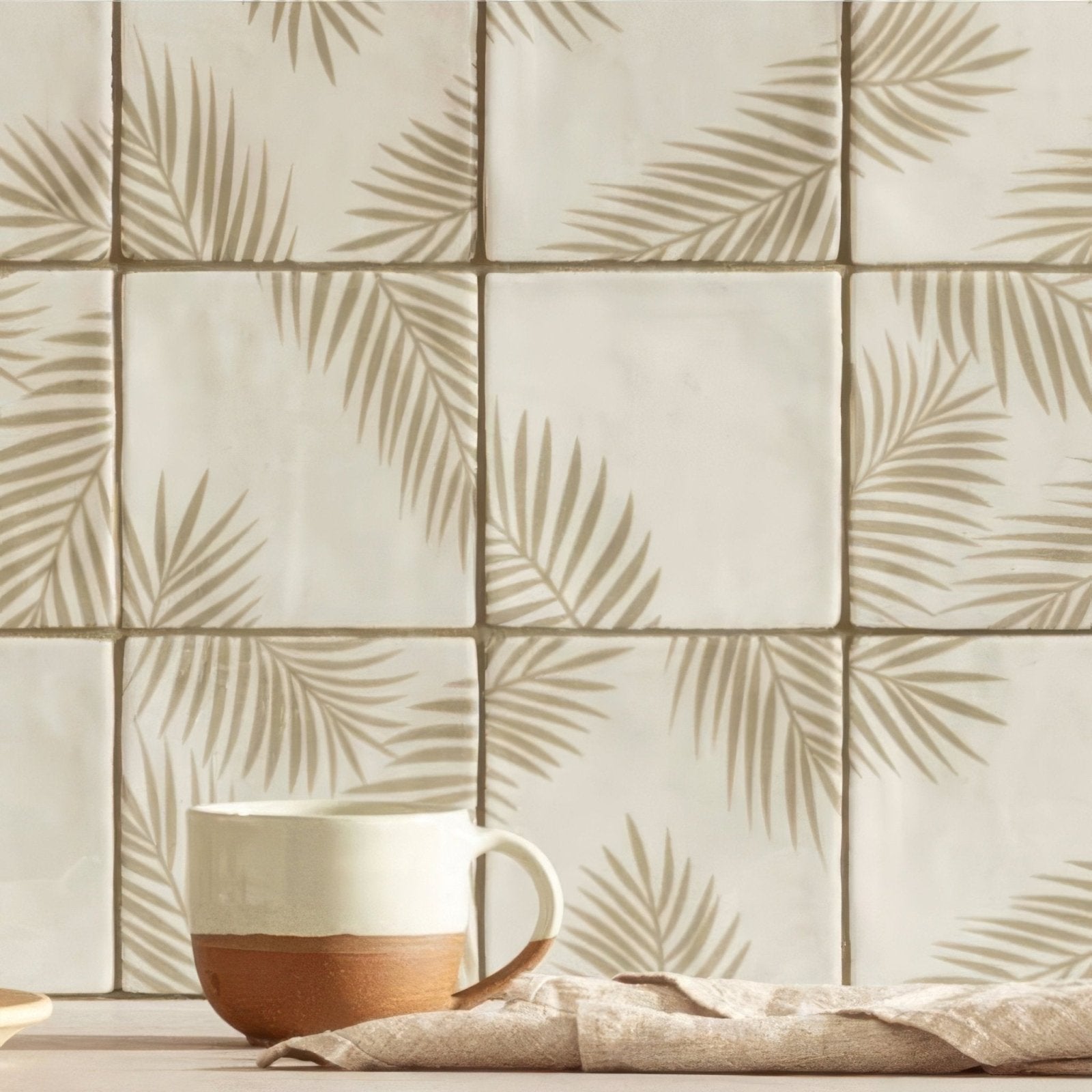 A ceramic mug Paradis Mere 1 with white upper half and terracotta lower half two-tone finish