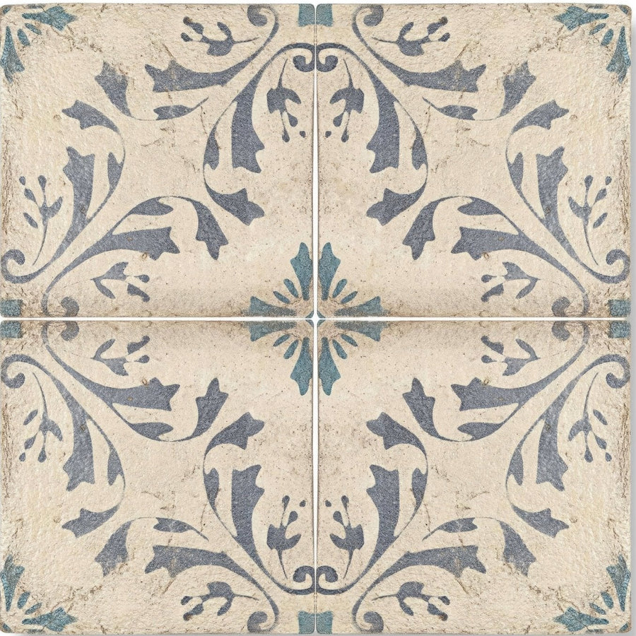 Vintage style paris josette square tile with intricate blue and gray floral patterns on distressed beige background