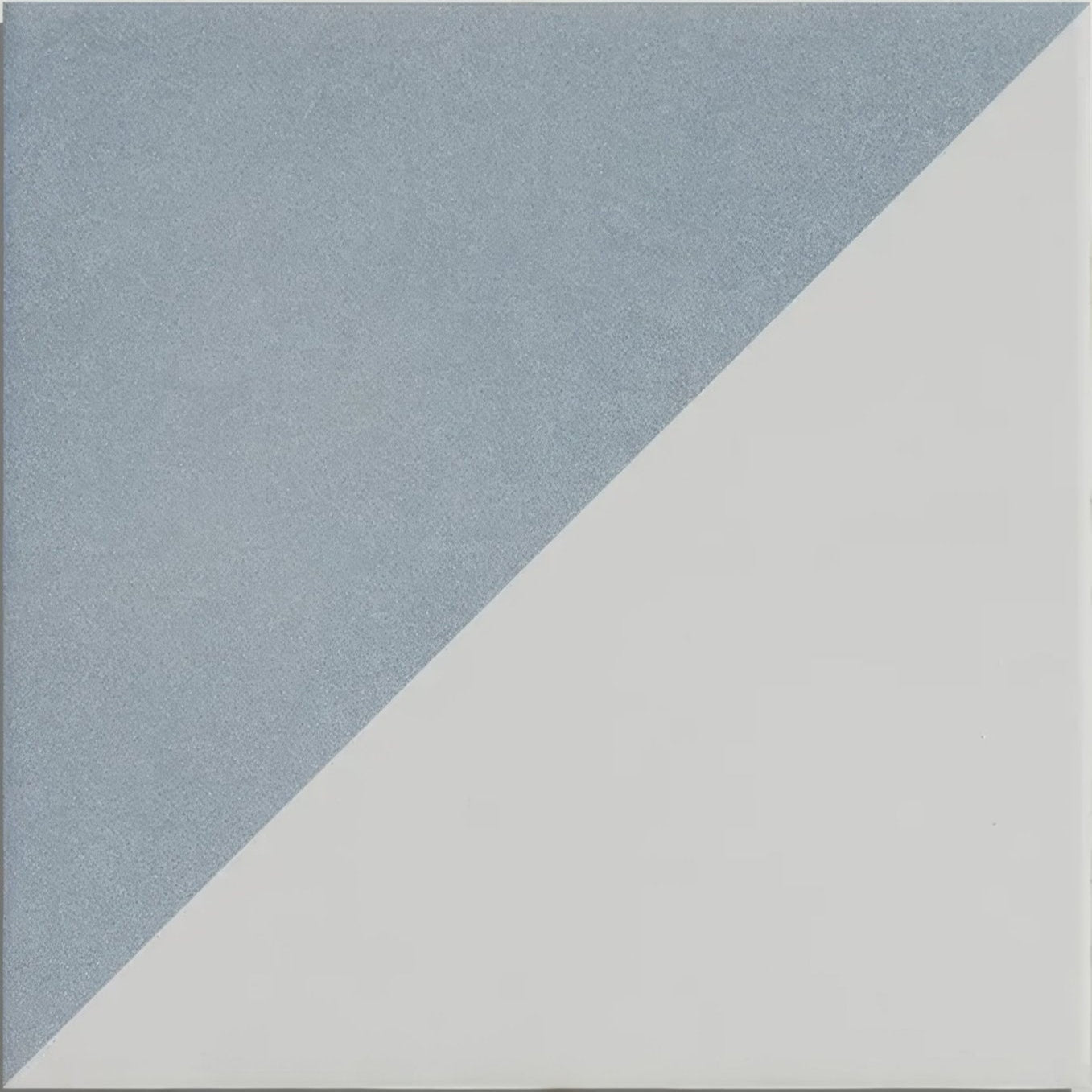 A parisian café porcelain tri blue ceramic tile split diagonally in soft matte blue and clean white colors