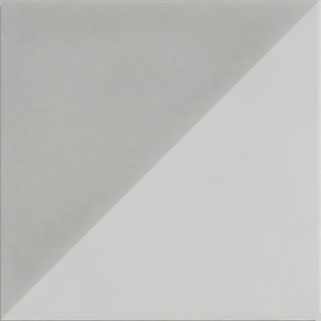 A minimalist parisian café porcelain tile in tri dove grey with a diagonal split in matte gray and smooth white