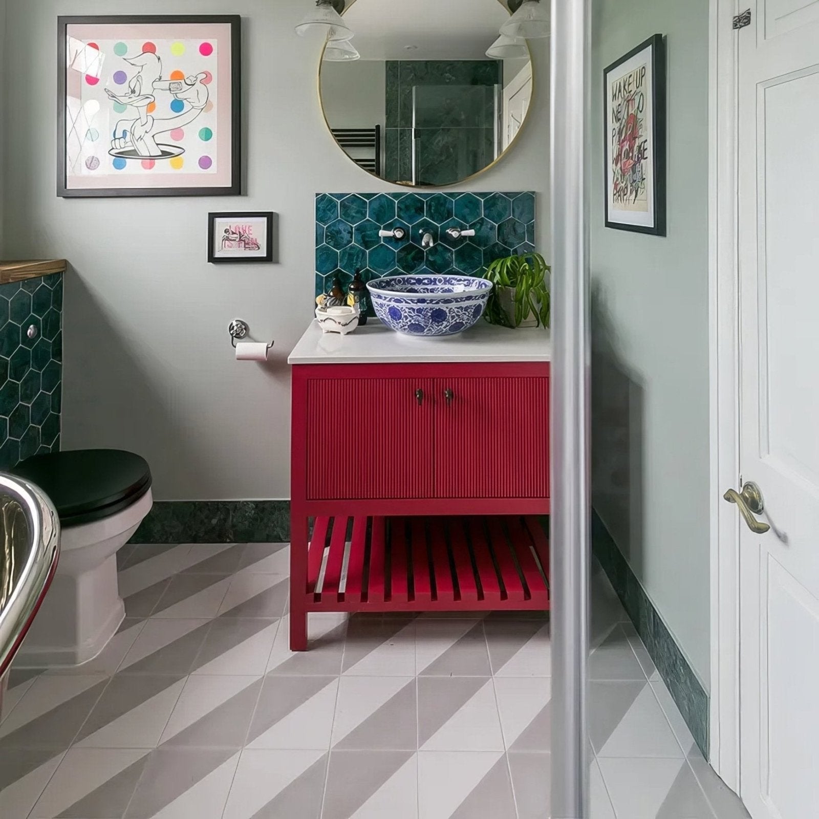 Vibrant red ribbed vanity with white countertop and ornate blue and white porcelain bowl sink parisian café porcelain tri dove grey