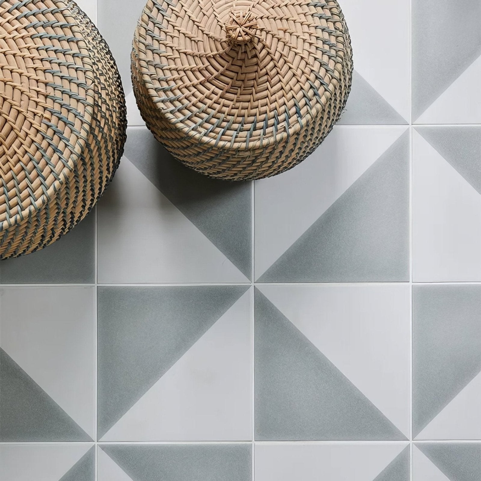 Handwoven beige and gray basket with a tight intricate weave pattern from parisian café porcelain tri dove grey collection