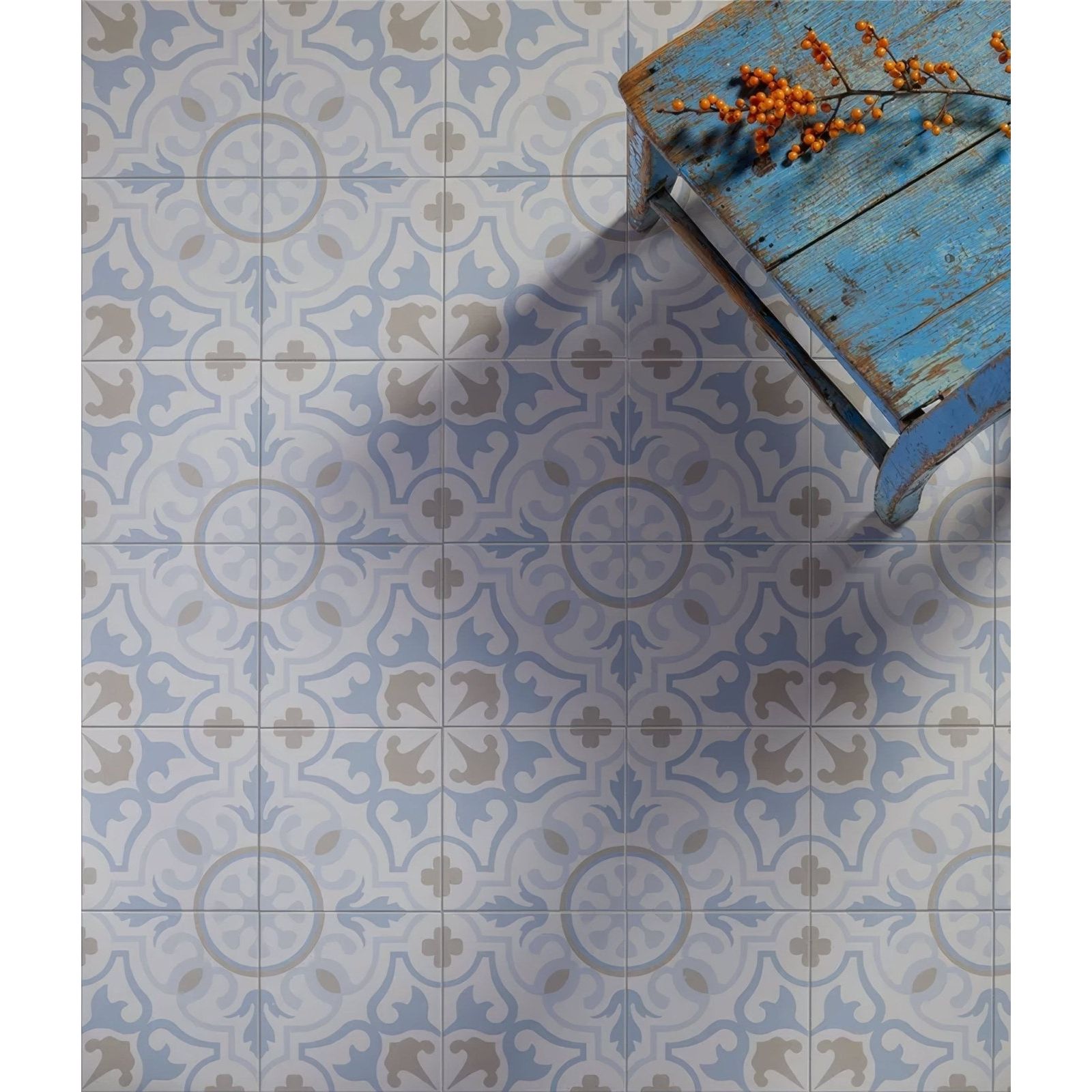 Blue and gray patterned ceramic floor tiles with vintage ornate design from parisian chic porcelain paix collection