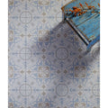 Blue and gray patterned ceramic floor tiles with vintage ornate design from parisian chic porcelain paix collection
