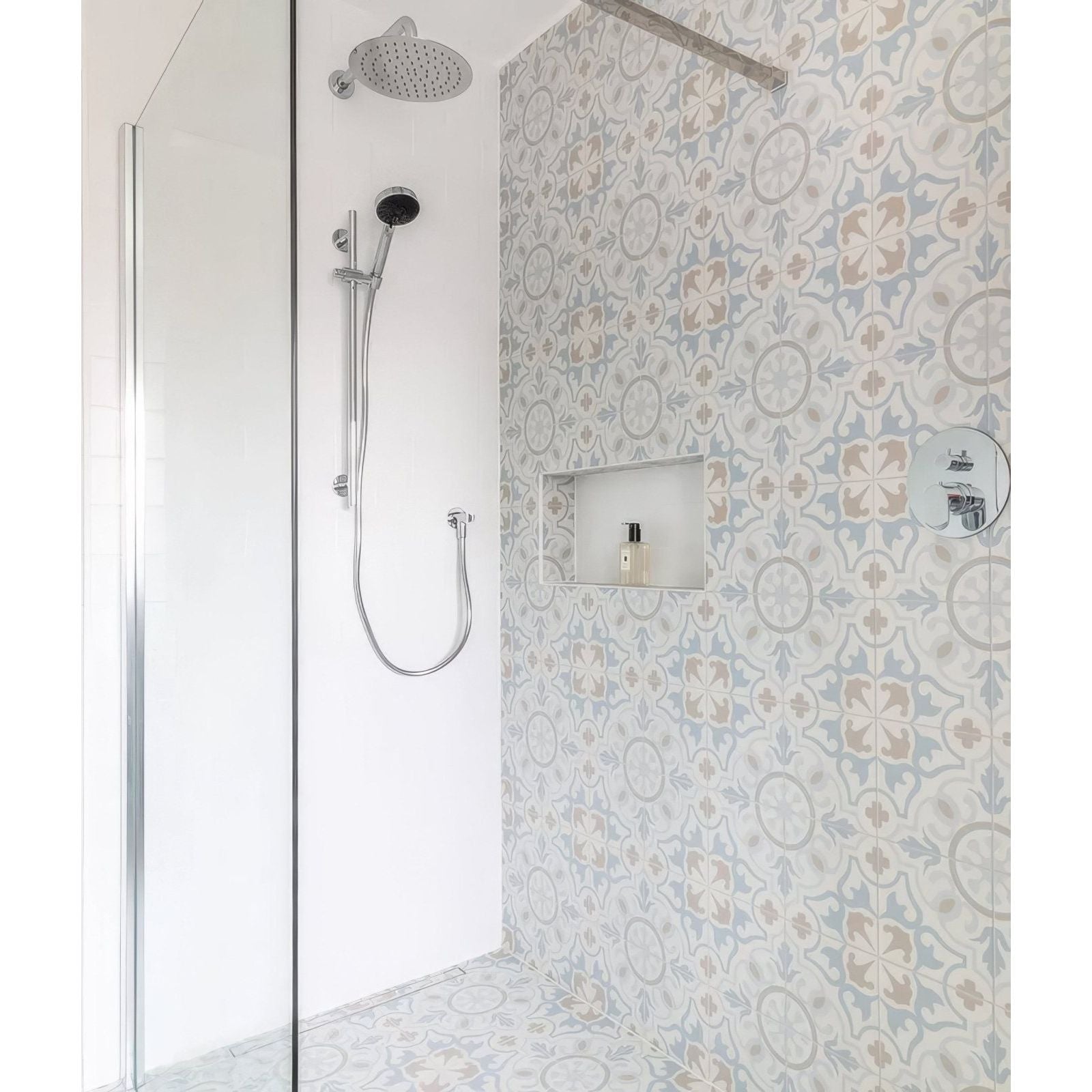 Modern chrome Parisian Chic porcelain Paix showerhead with sleek circular design and adjustable handheld attachment