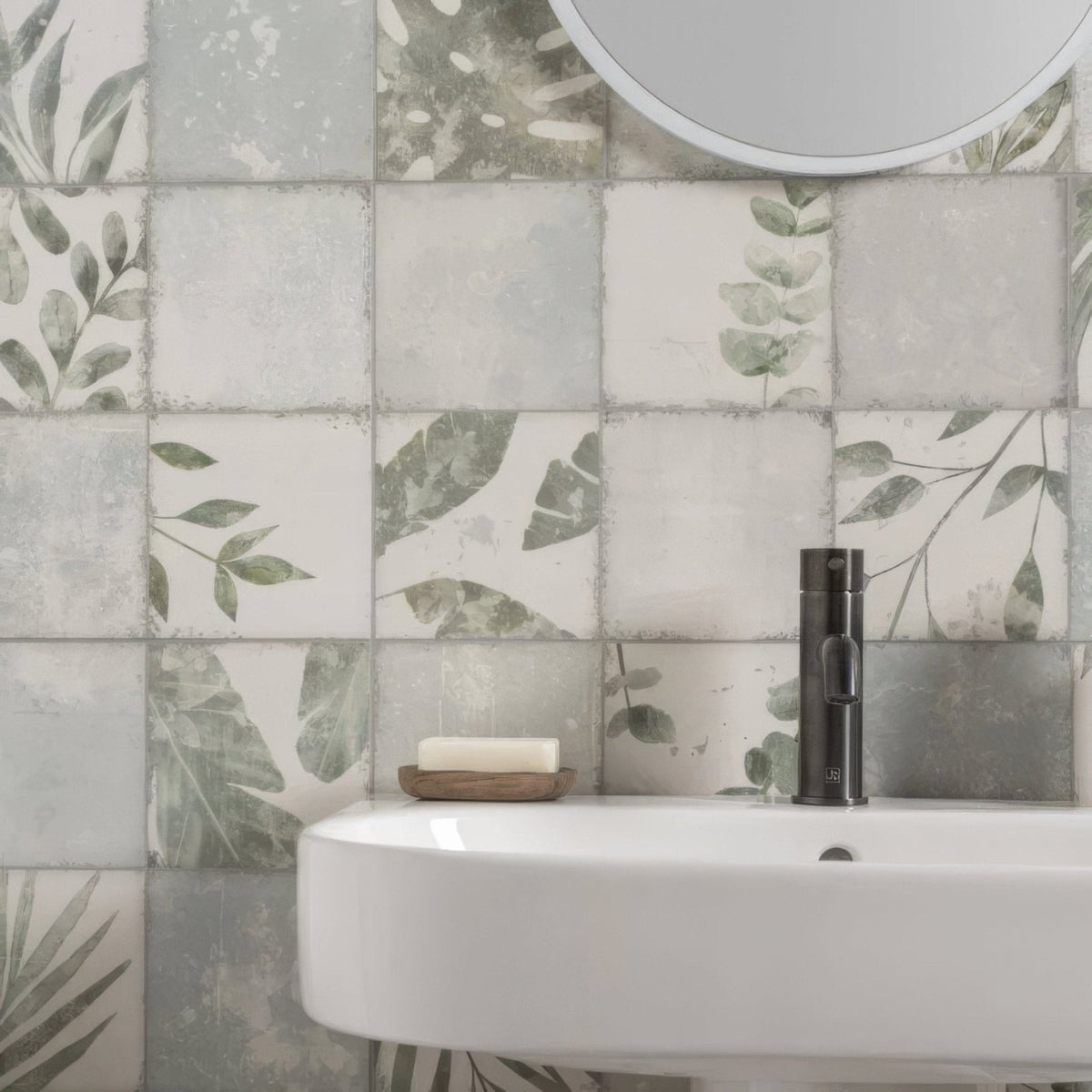 White ceramic sink with a sleek modern design and matte black faucet for the patchwork botanical iris 60x30cm product