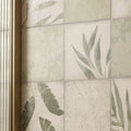 Patchwork botanical ivy 60x30cm wall tiles with muted green and gray botanical leaf pattern on textured off-white background