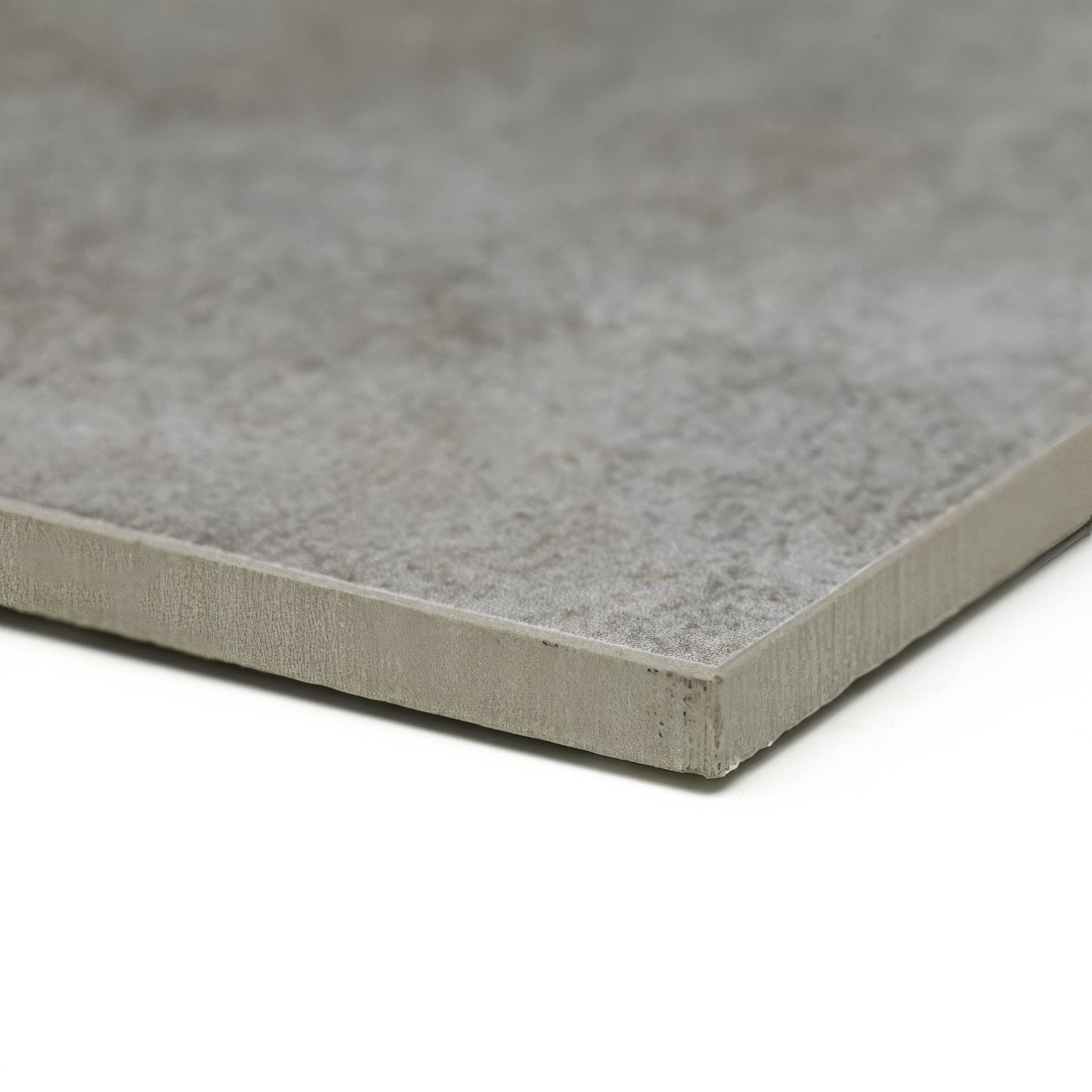 Patina nickel 59 x 59cm gray concrete-effect tile with textured speckled surface and slightly rough edges