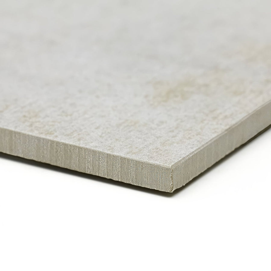A rectangular light gray ceramic tile patina sand 59 x 29cm with subtle texture and beveled edges