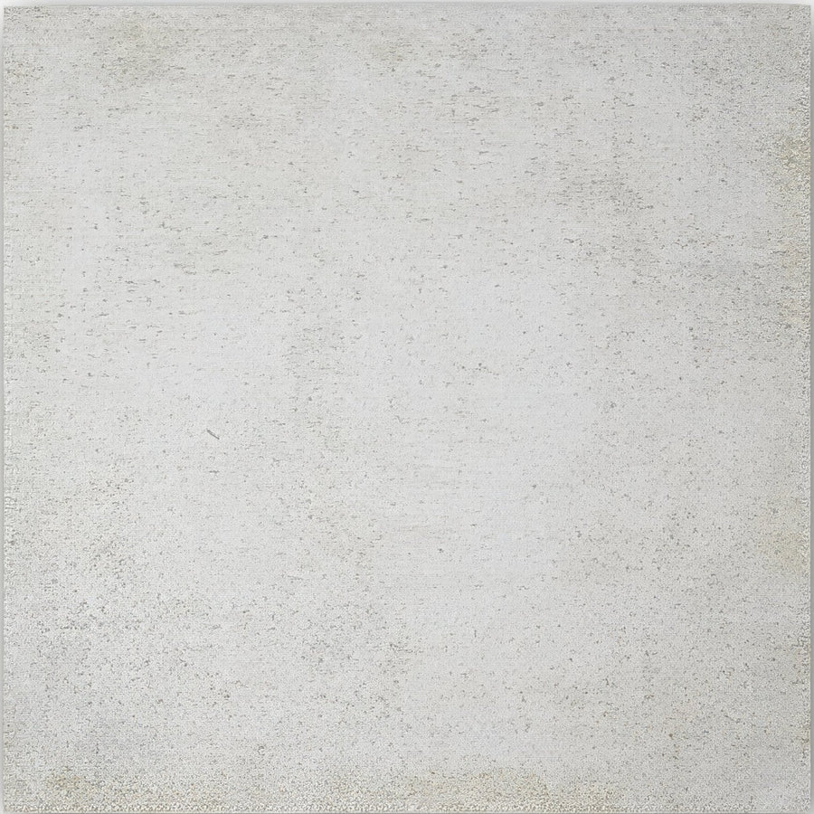 A square textured concrete tile patina sand 59 x 59cm with a subtle grayish white finish and faint speckles