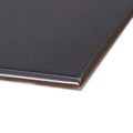 Black rectangular patisserie dark porcelain base tile with smooth matte finish and brown edges