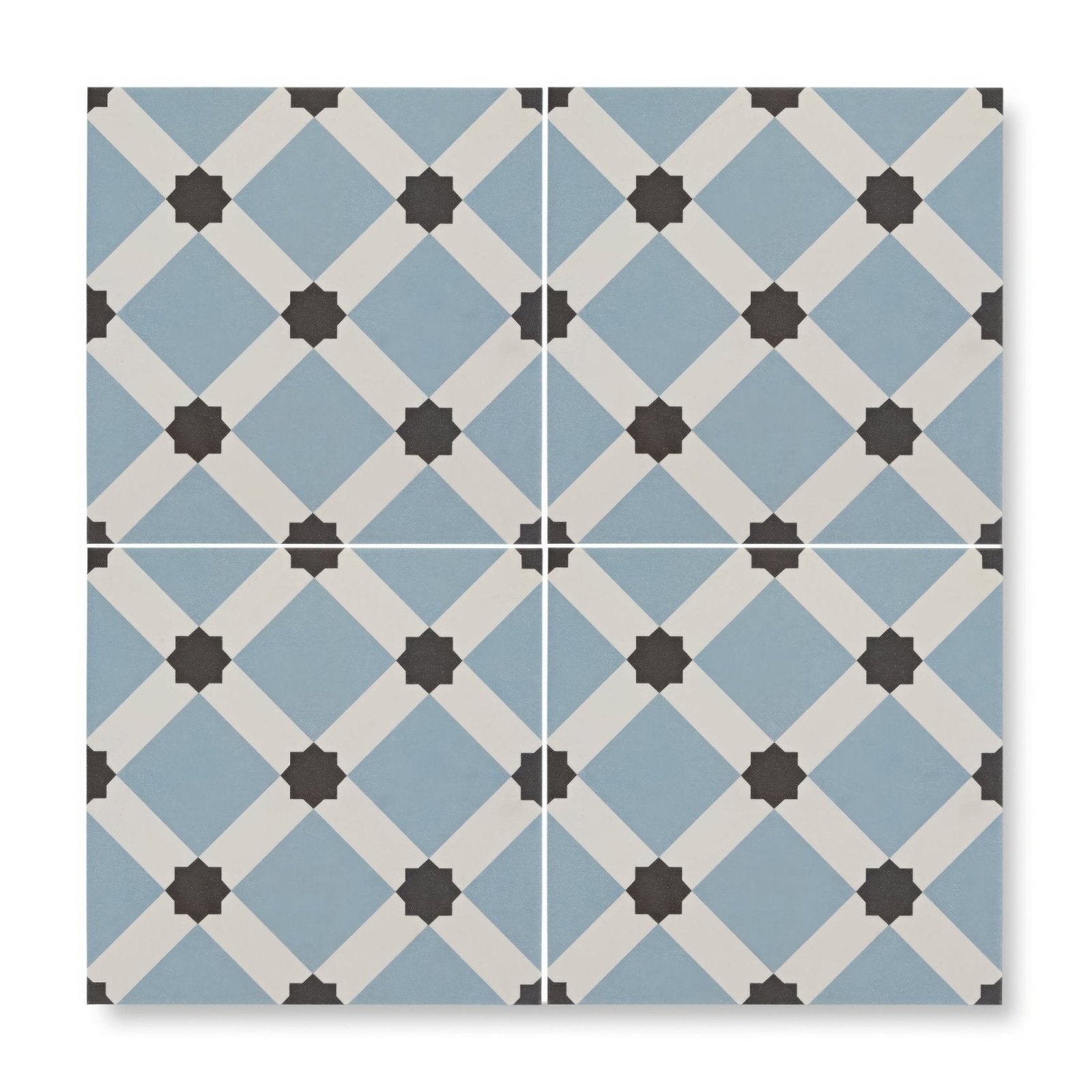 Patisserie hevin blue patterned ceramic tile with blue and white geometric design and black star accents