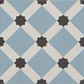 Patisserie hevin blue patterned tile with blue and white geometric design and black star-shaped accents for flooring or walls