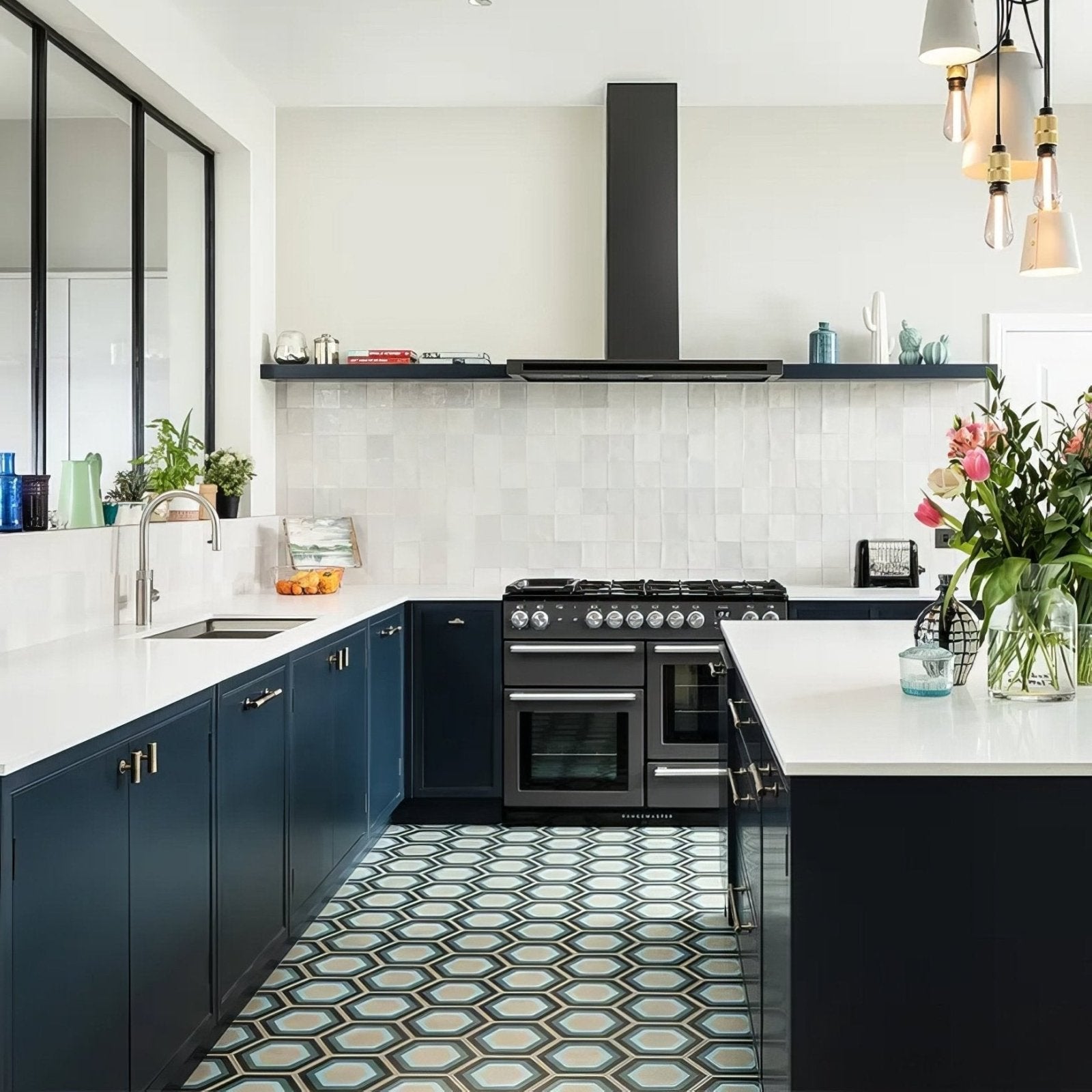 Black range cooker patisserie porcelain blue with multiple burners and oven doors sleek metallic finish