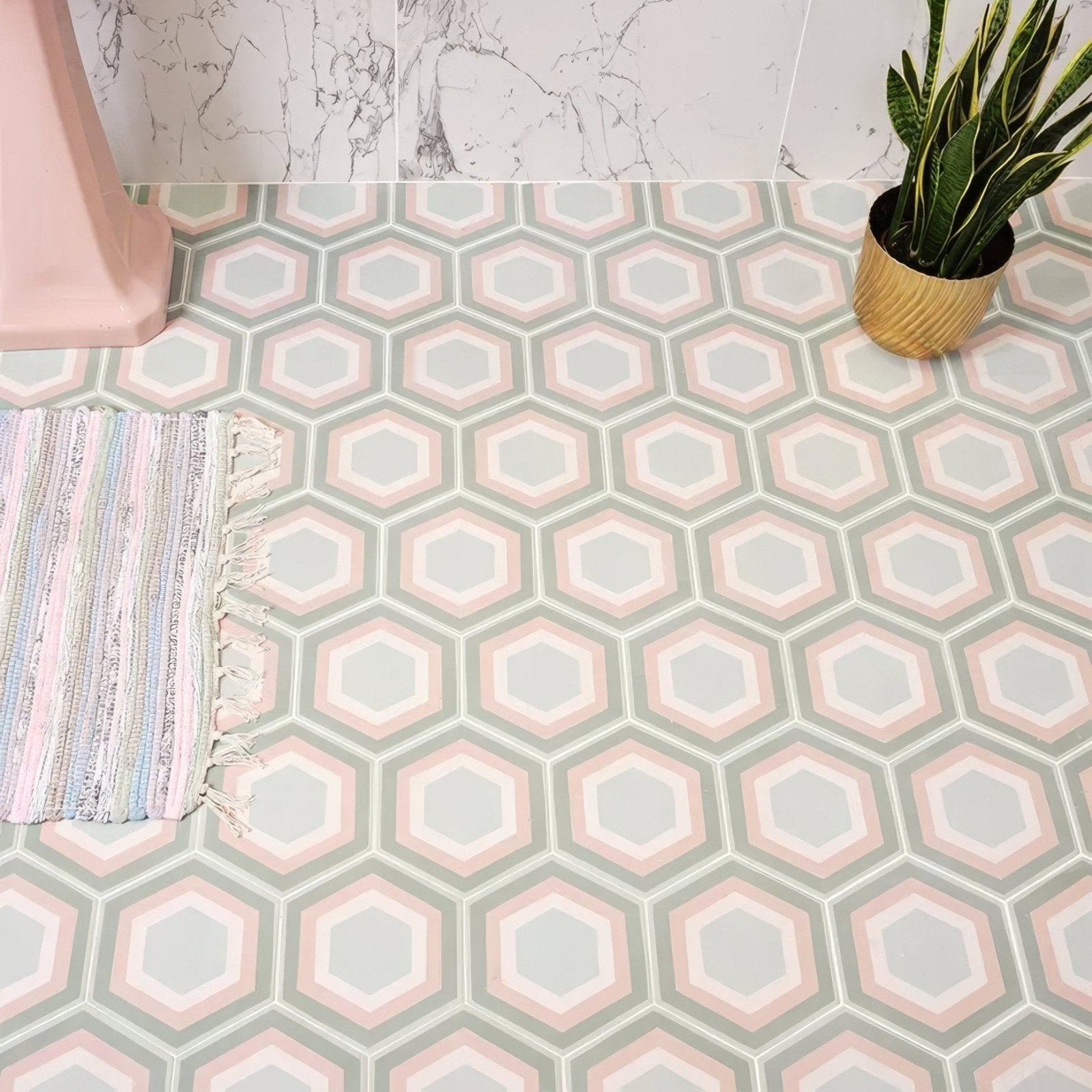 Hexagonal patisserie porcelain rose mint floor tiles with a soft pastel pattern in muted pink sage green and light gray
