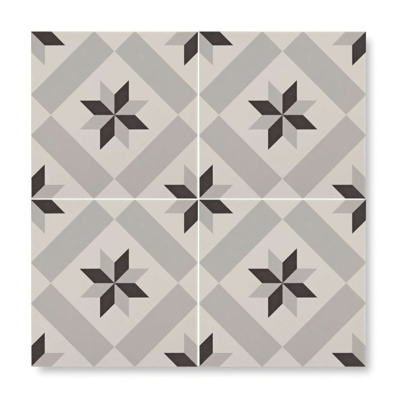Gray and black geometric patterned tile with starburst motifs from patisserie sucre 1 patterned tile collection