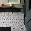 Geometric mosaic porcelain floor tiles in white beige and dark gray squares from pavilion porcelain marine blue collection