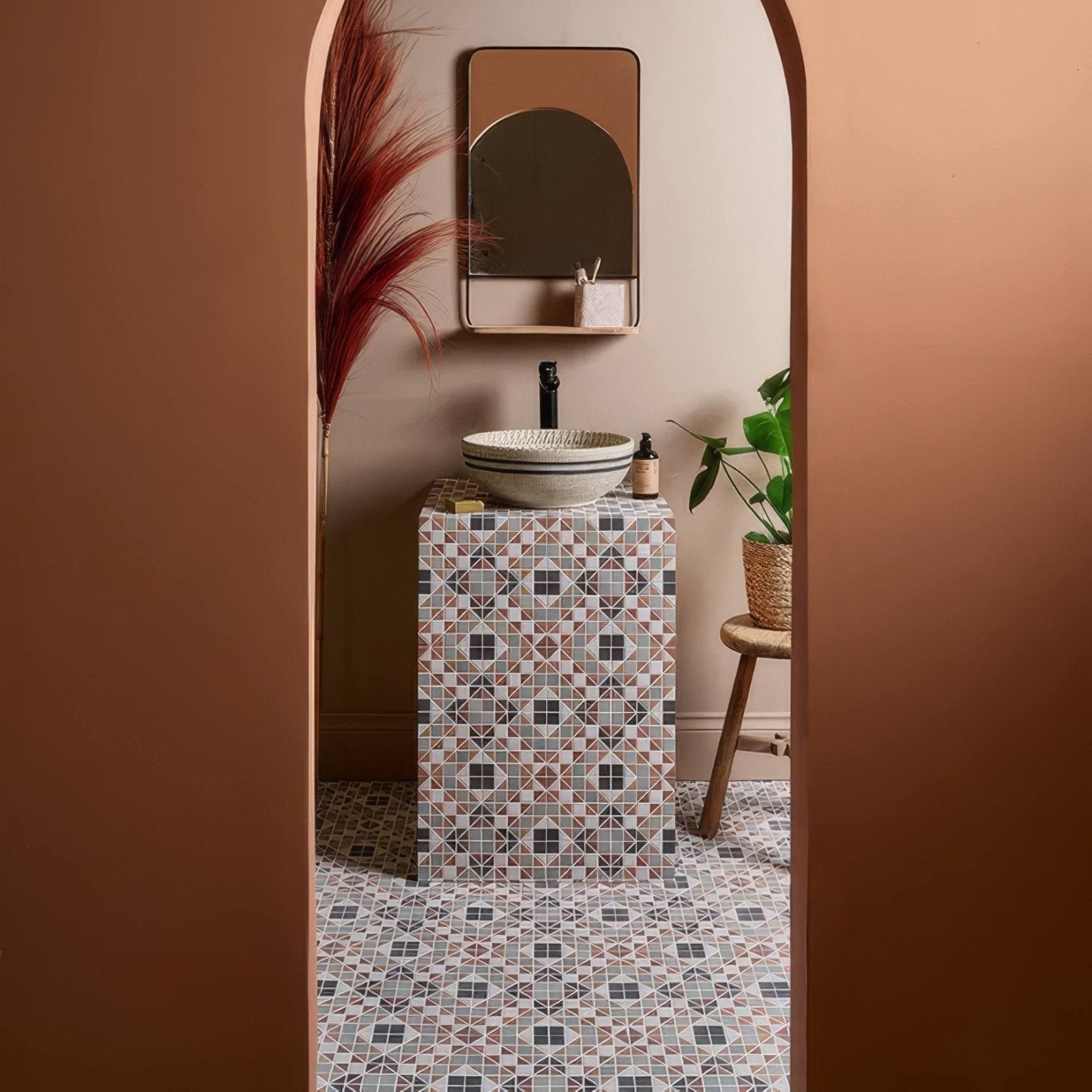 Pavilion Porcelain Russet Red geometric porcelain mosaic with a white striped bowl sink
